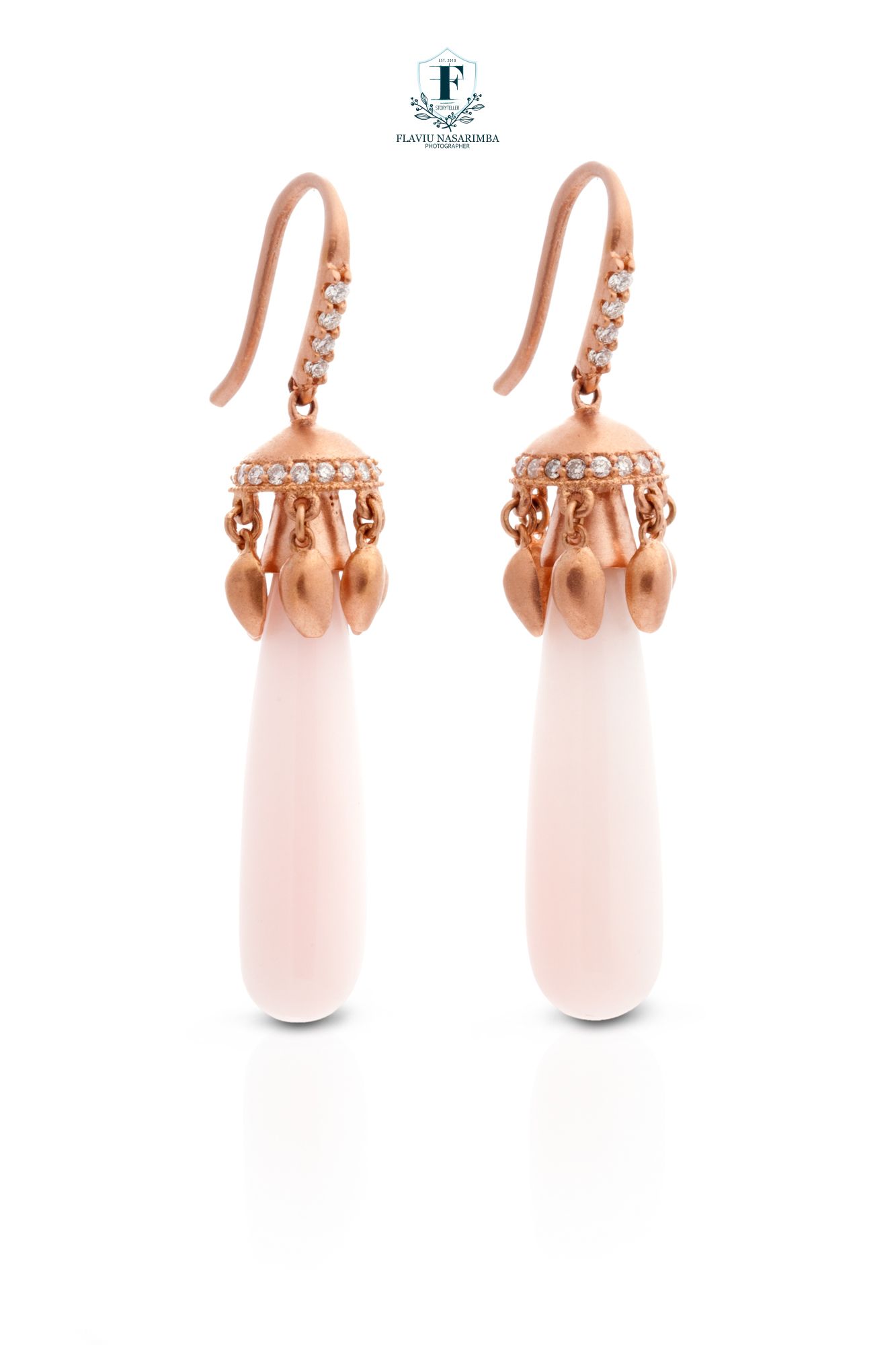 Rose gold drop earrings with diamond-studded caps, gold bead accents, and smooth pale pink coral drops.