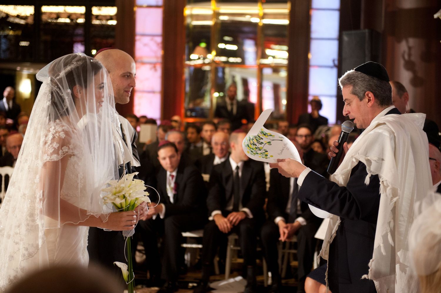 A wedding ceremony in progress with guests watching as the bride walks down a long aisle in a church.