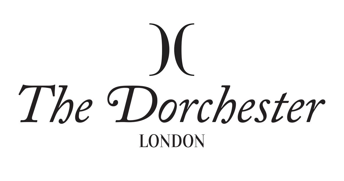 The Dorchester London hotel brand mark in elegant black lettering.