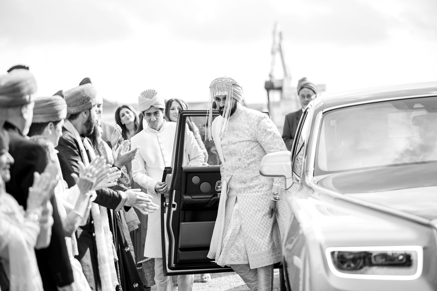 A collection of vintage black and white wedding photographs showing joyful moments and classic cars from the 1950s era.
