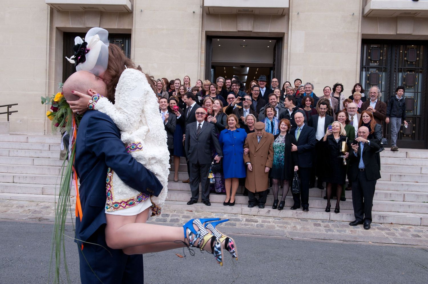 A series of candid wedding photos showing couples dancing and celebrating at a reception venue.