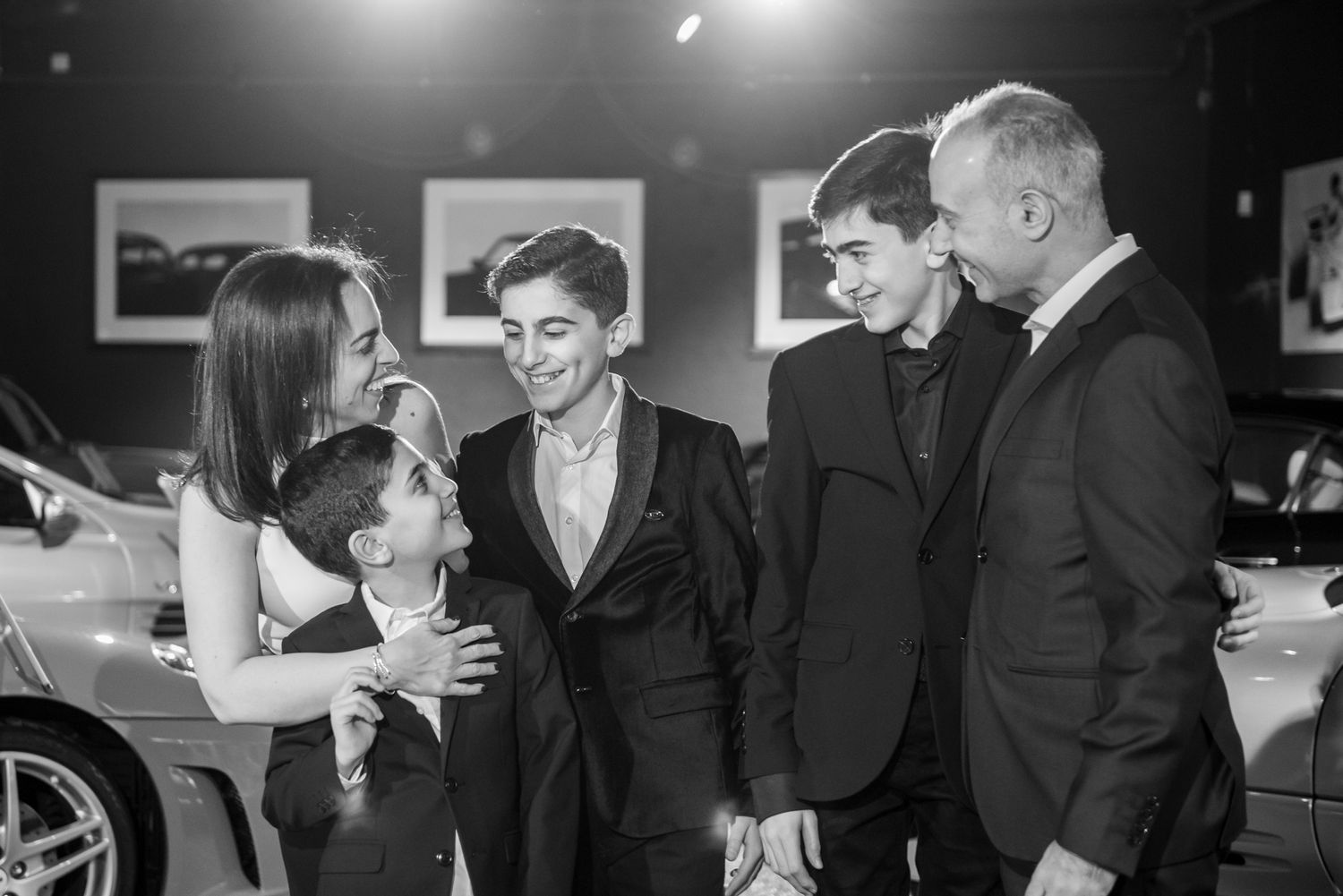 A black and white photo collage showing couples dancing at what appears to be a formal evening event.