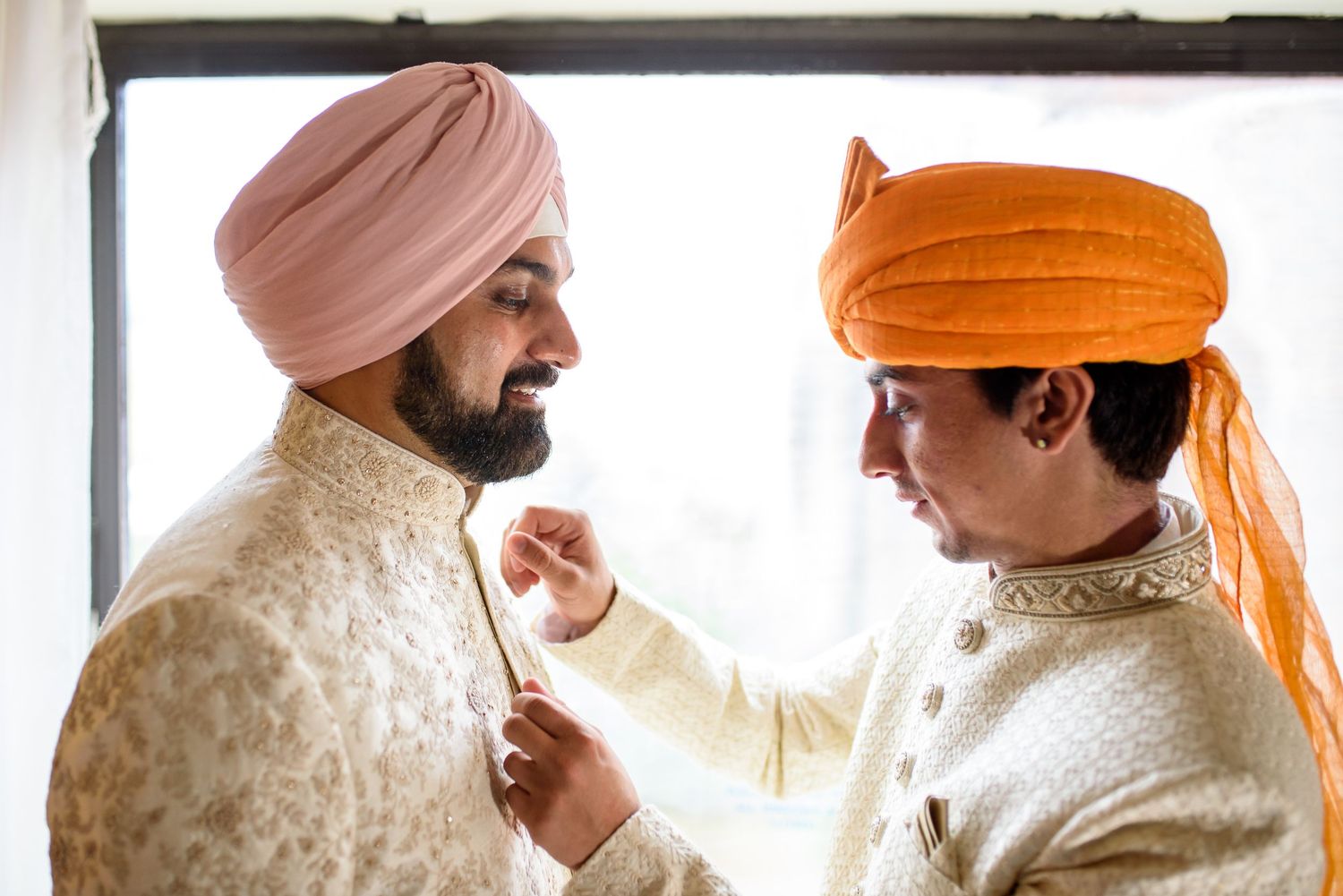 A collage of traditional Sikh wedding attire featuring ornate cream and gold sherwani outfits with matching turbans.