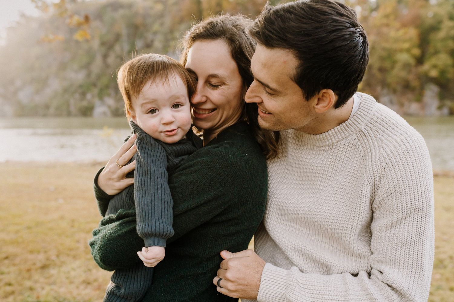 Young family snuggles together during knoxville family photos