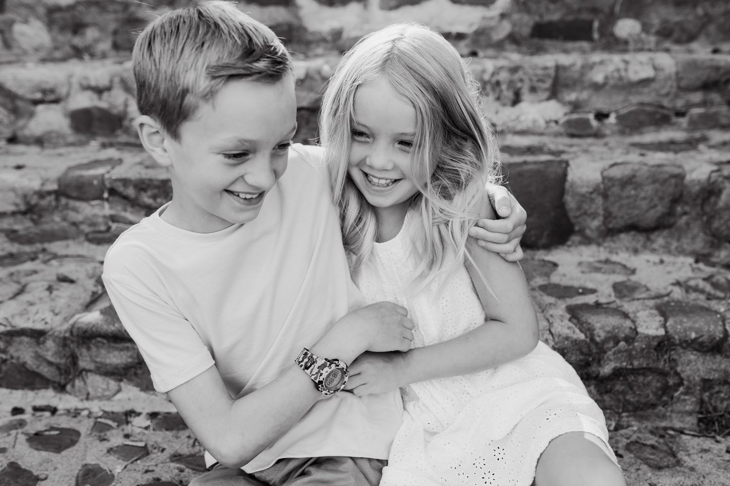 Sibling portrait as they play together