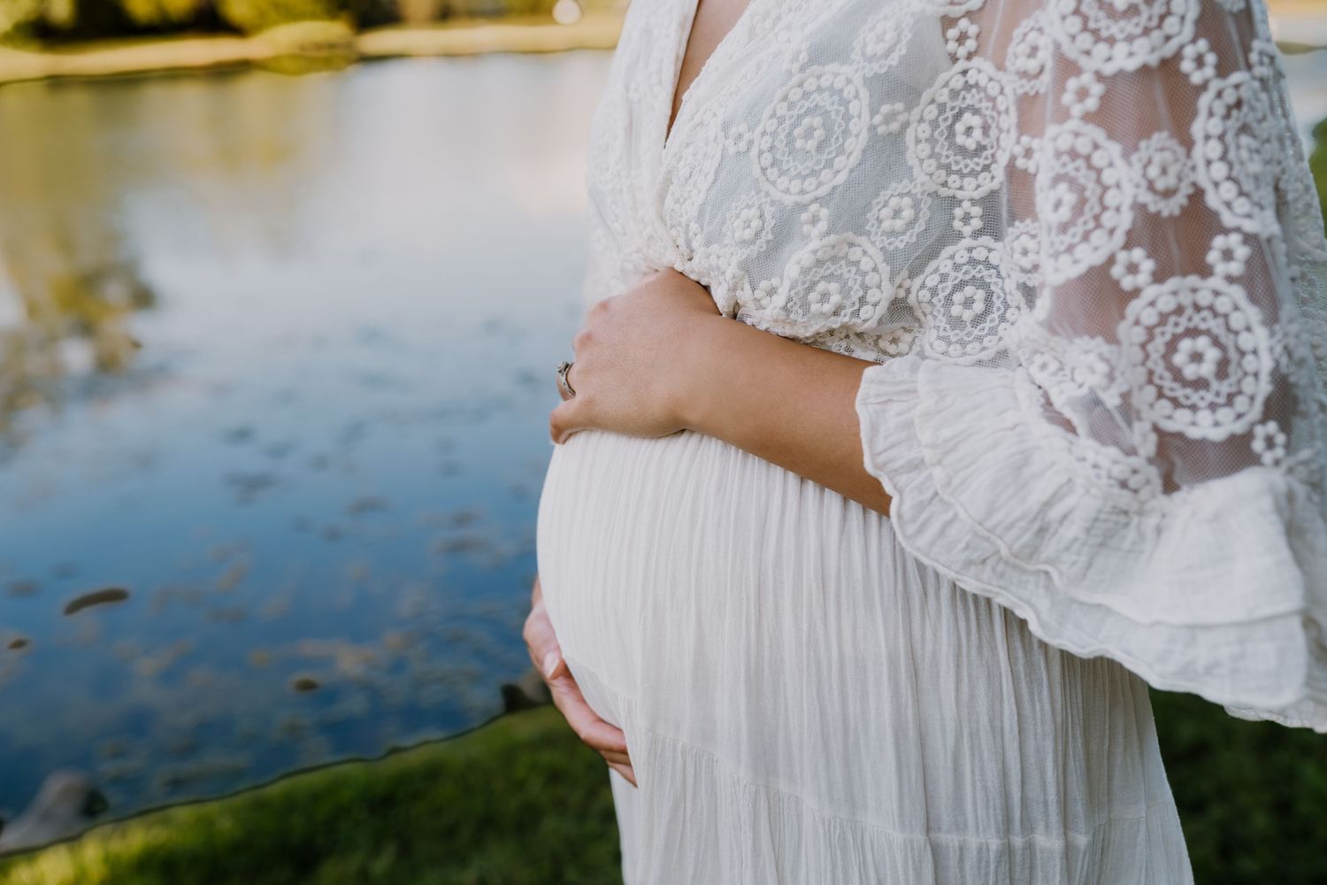 Hands on pregnant belly
