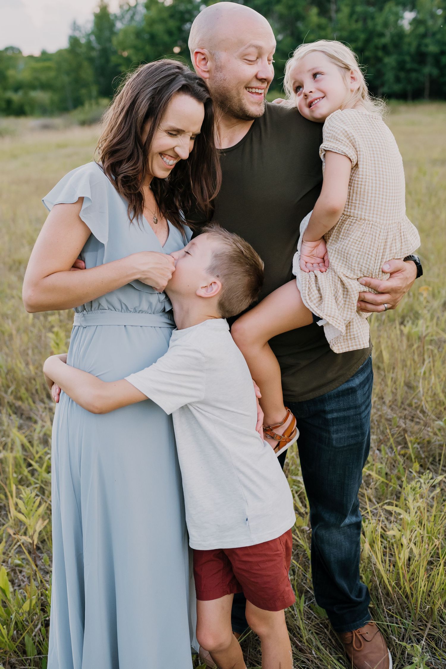 family playing in field