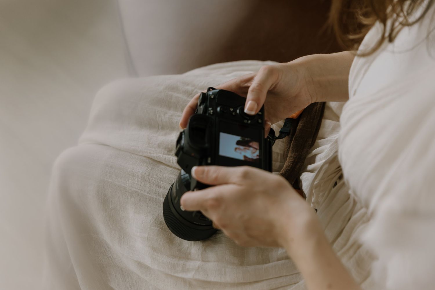 Woman holds camera