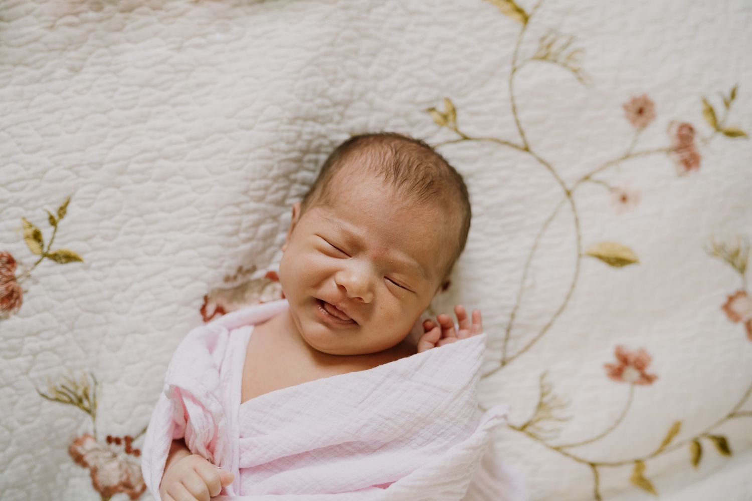 Newborn stretching during newborn photos
