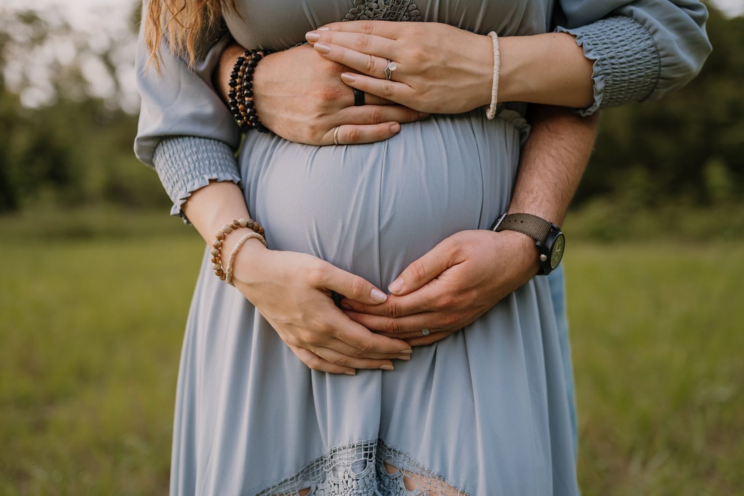 Hands on pregnant belly during Maryville Maternity Photography session