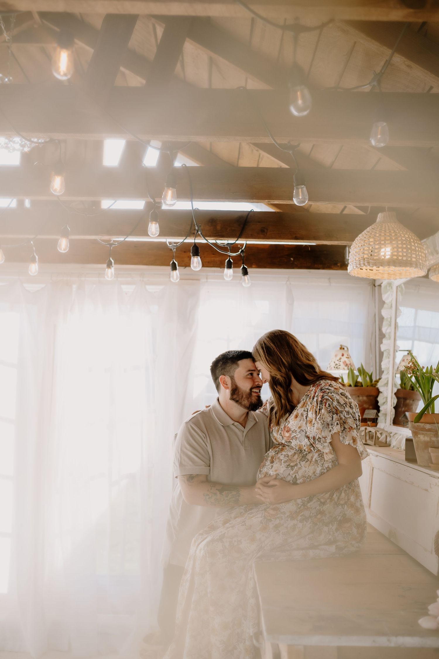 Parents pose together in Karns for maternity photos