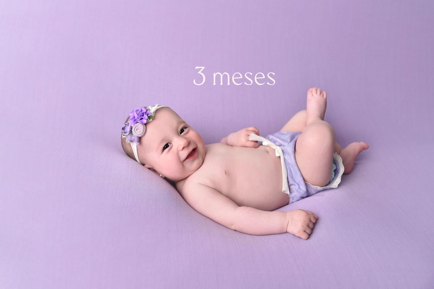 Baby wearing purple bow lies on lavender backdrop in multiple poses showing growth milestones at 3 months.