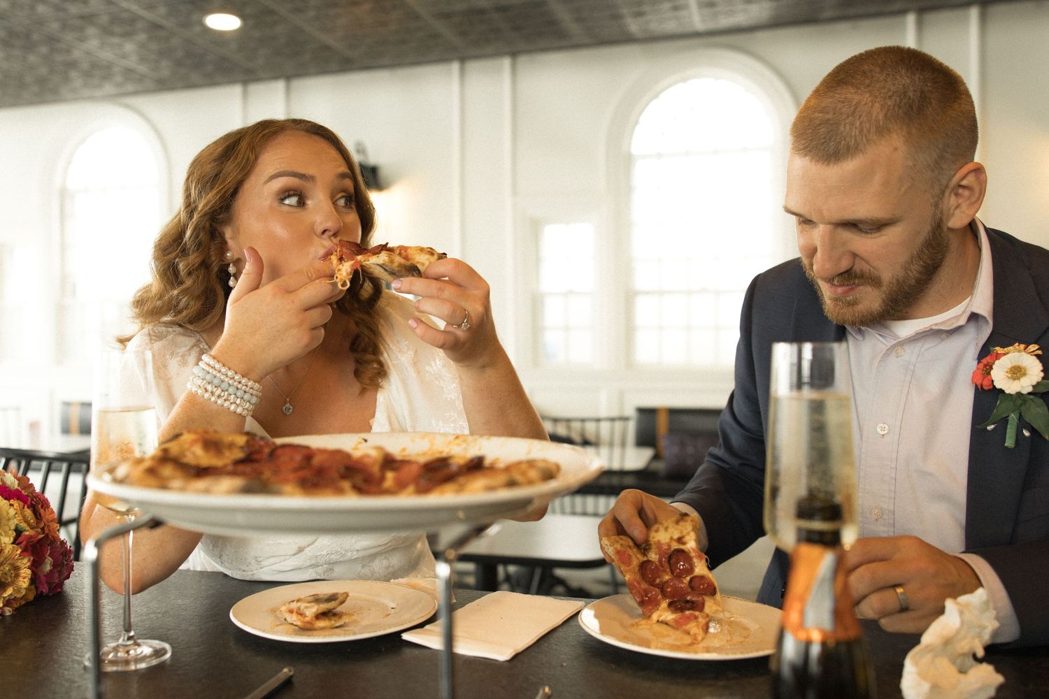 Sequence of people eating messy sandwiches at a restaurant counter, showing progression of bites from left to right.