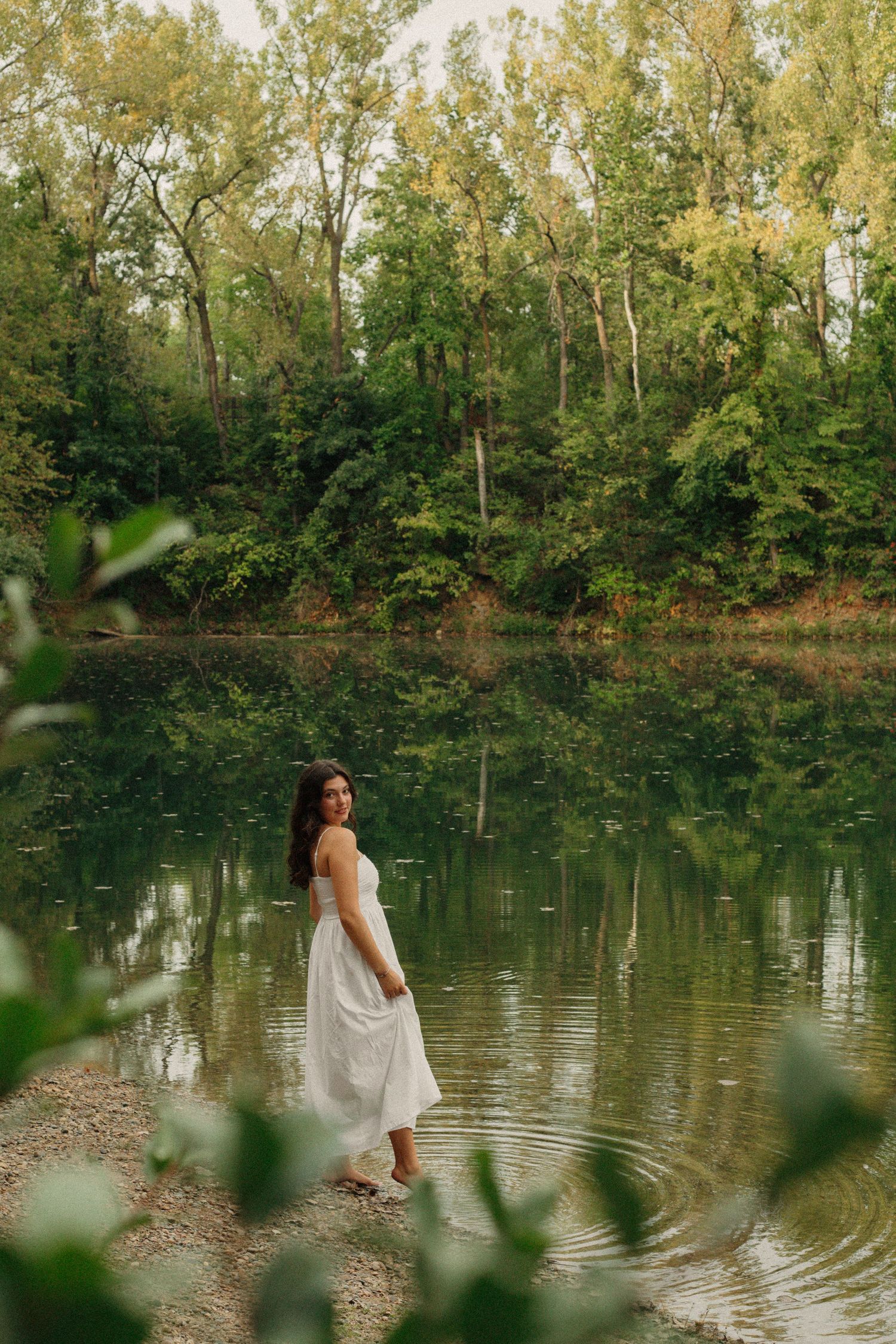 Mia Luna's Senior Pictures at Crow Creek Park, by the pond