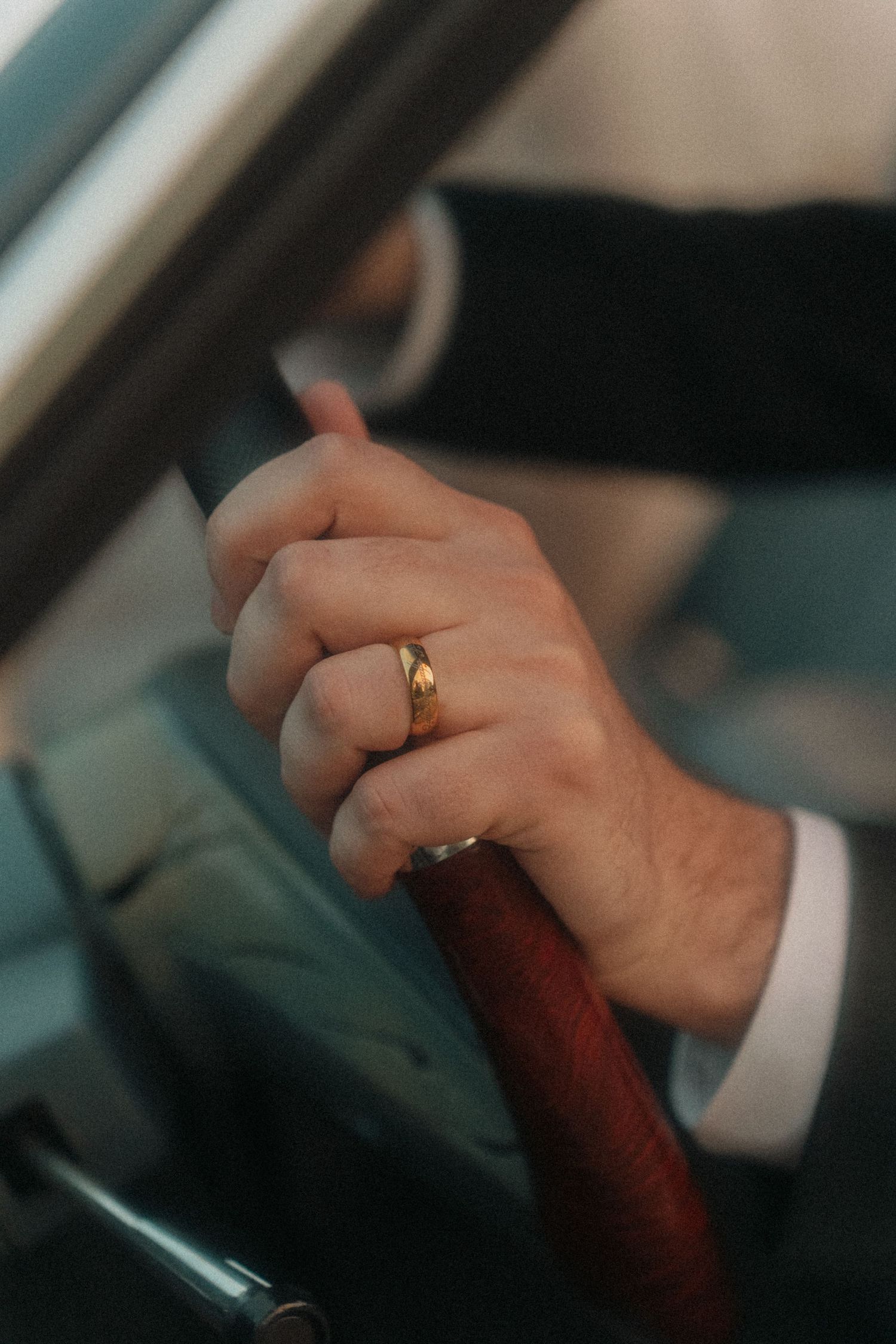 Jonah's Ring detail and he and Kathy drive away in her dad's car