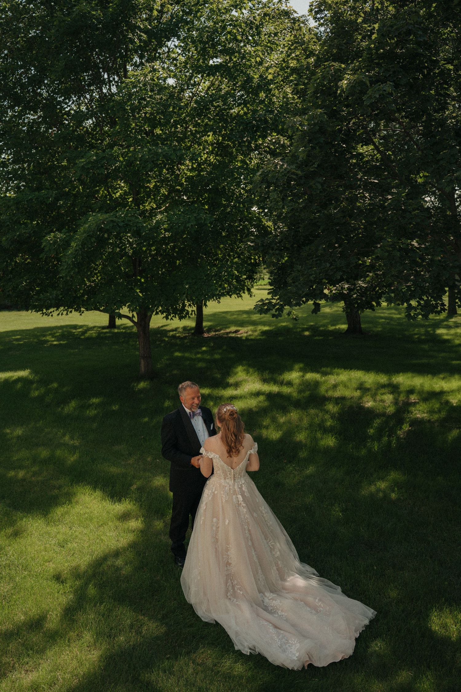 Danielle and her Father during their first look at lavender crest winery in Colona Illinois