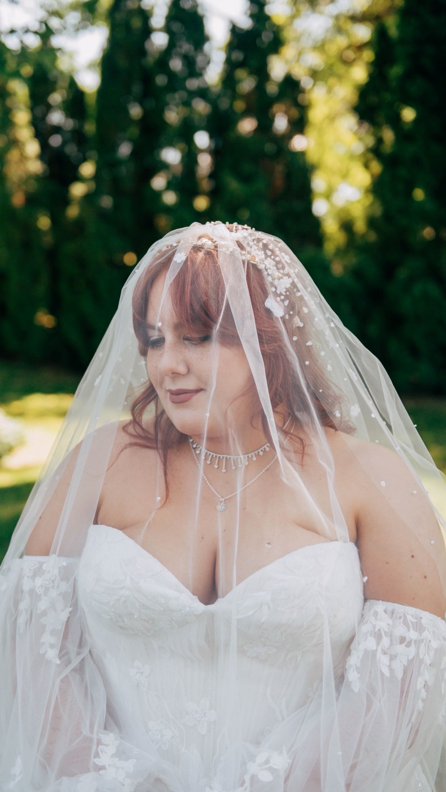 Close-up bridal portraits showing intricate details of wedding veil and makeup.