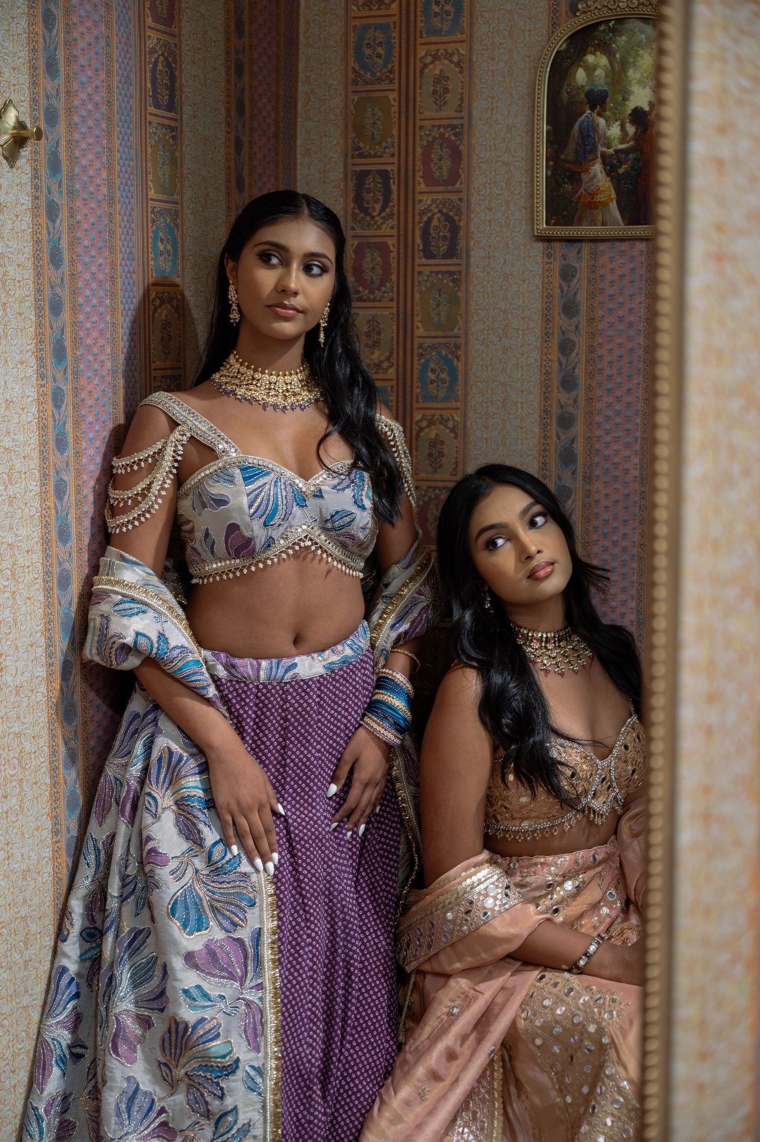 Models showcase ornate South Asian formal wear with intricate beadwork and traditional jewelry.