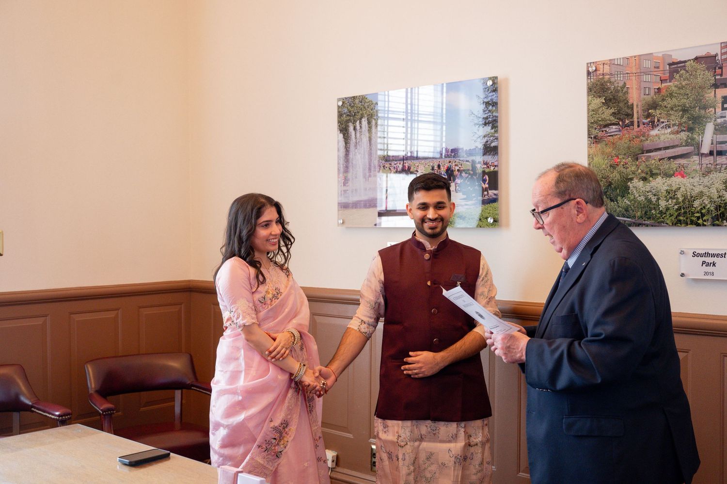 Healthcare professionals interact with patients in a medical facility showing various consultation and care scenarios.