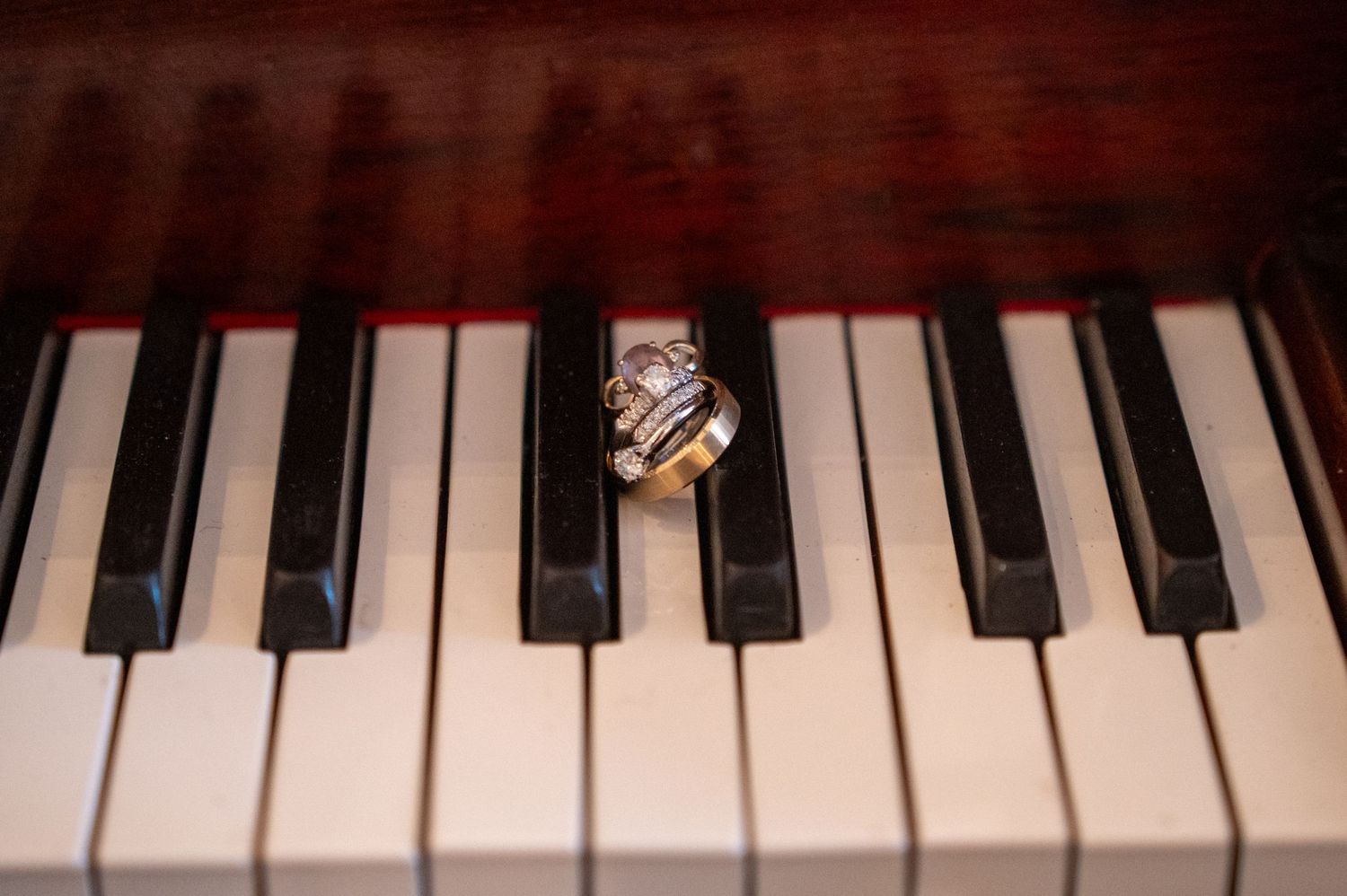 Close-up view of piano keys showing black and white keys in a repeating pattern.