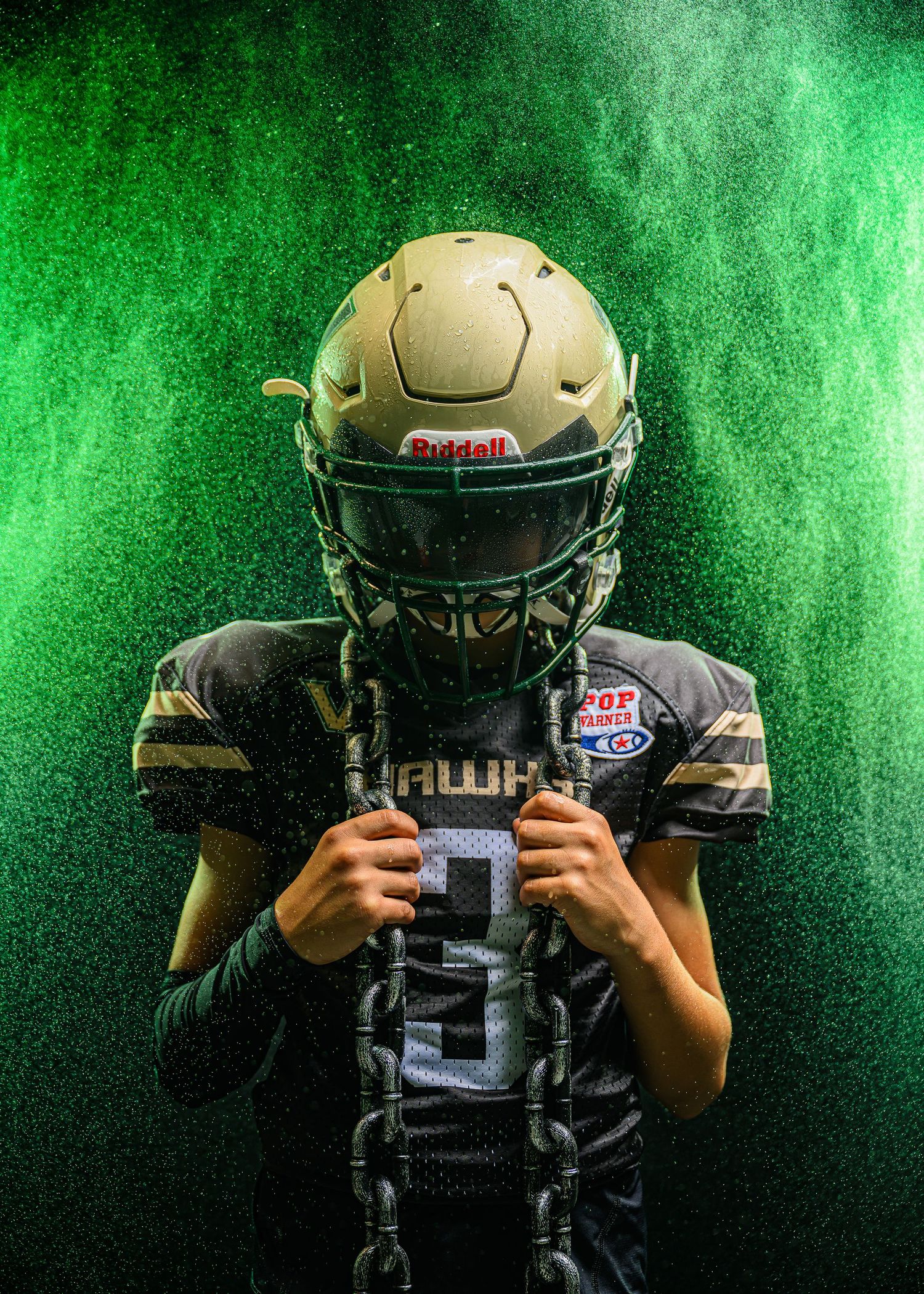 Football players with gold helmets photographed in dramatic green lighting from left to right for sports marketing composite.