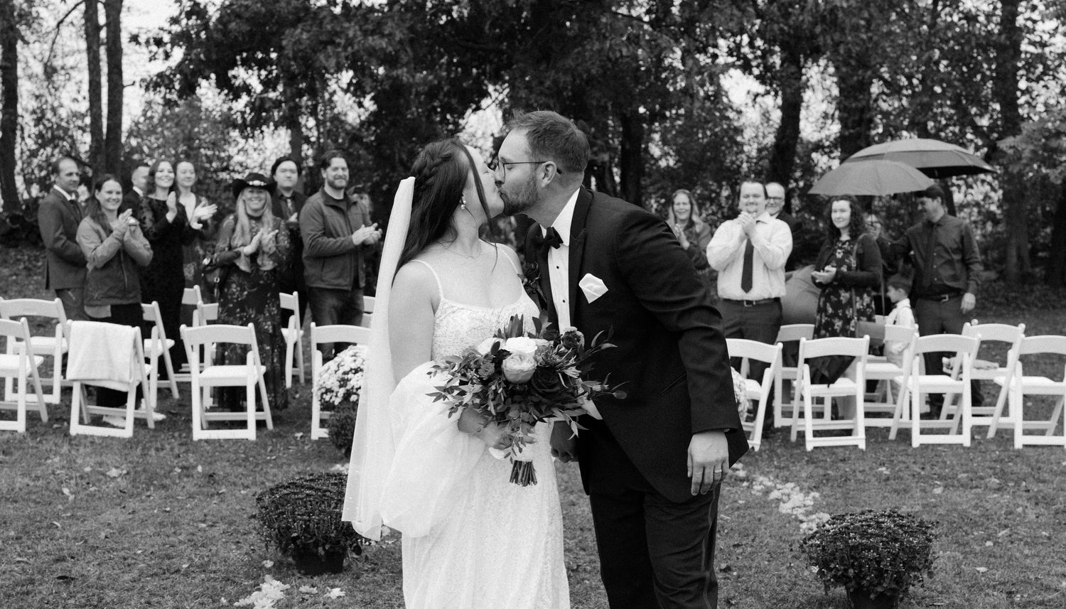 A collage of black and white wedding photos showing ceremony and reception moments in an outdoor garden setting.