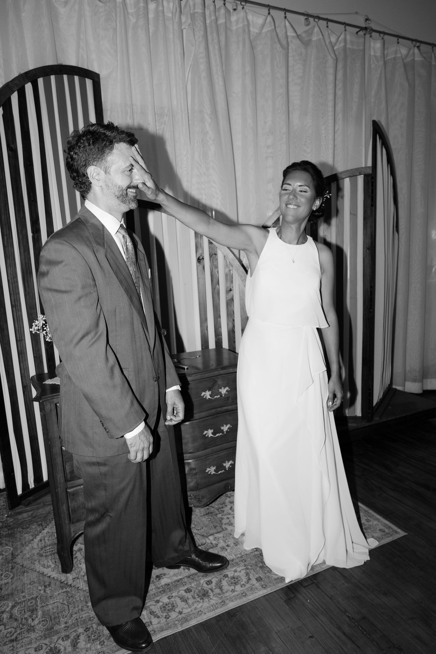 Black and white photos showing couples dancing at a wedding reception.