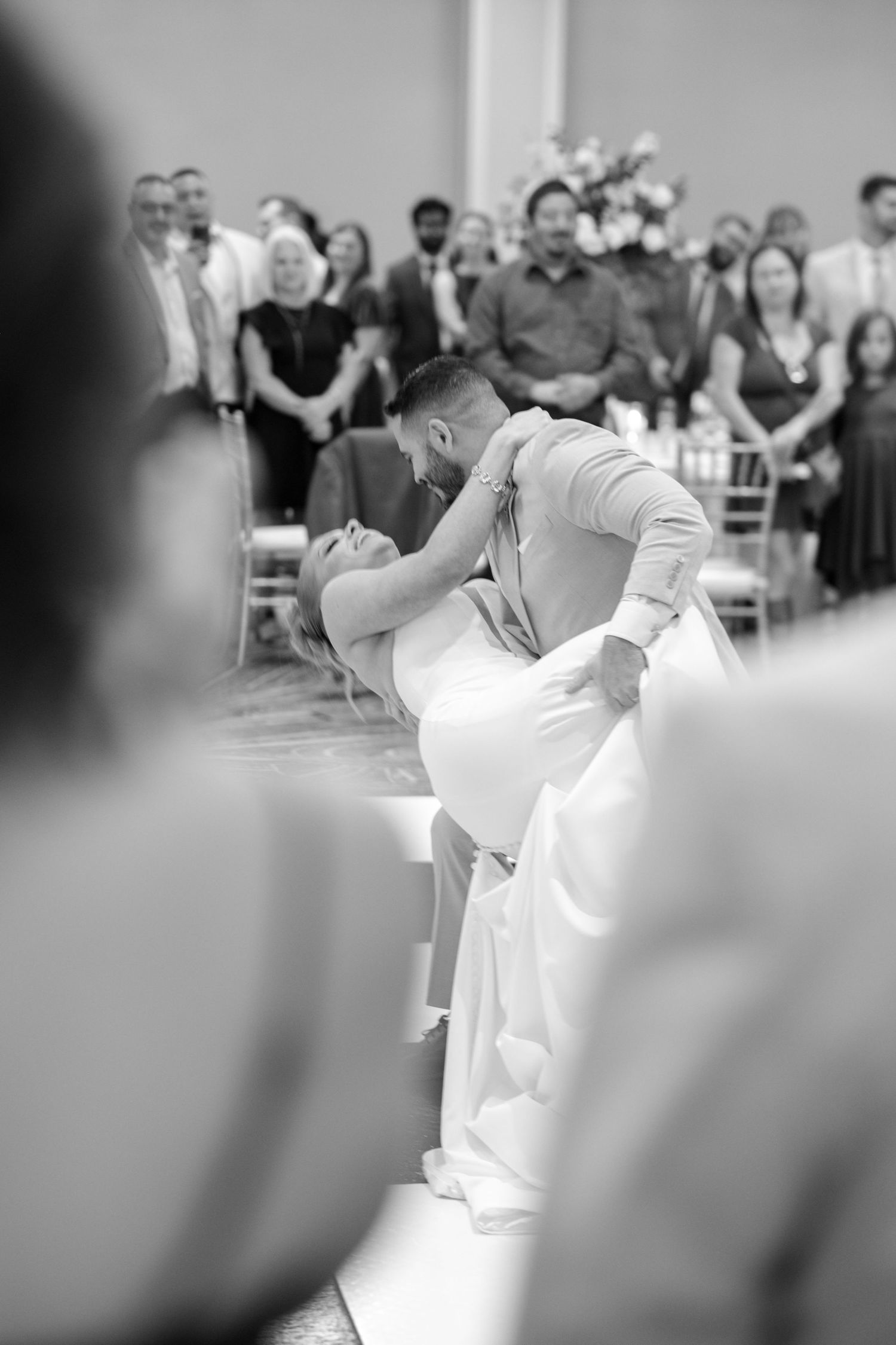 Black and white photos of a wedding reception dance sequence.