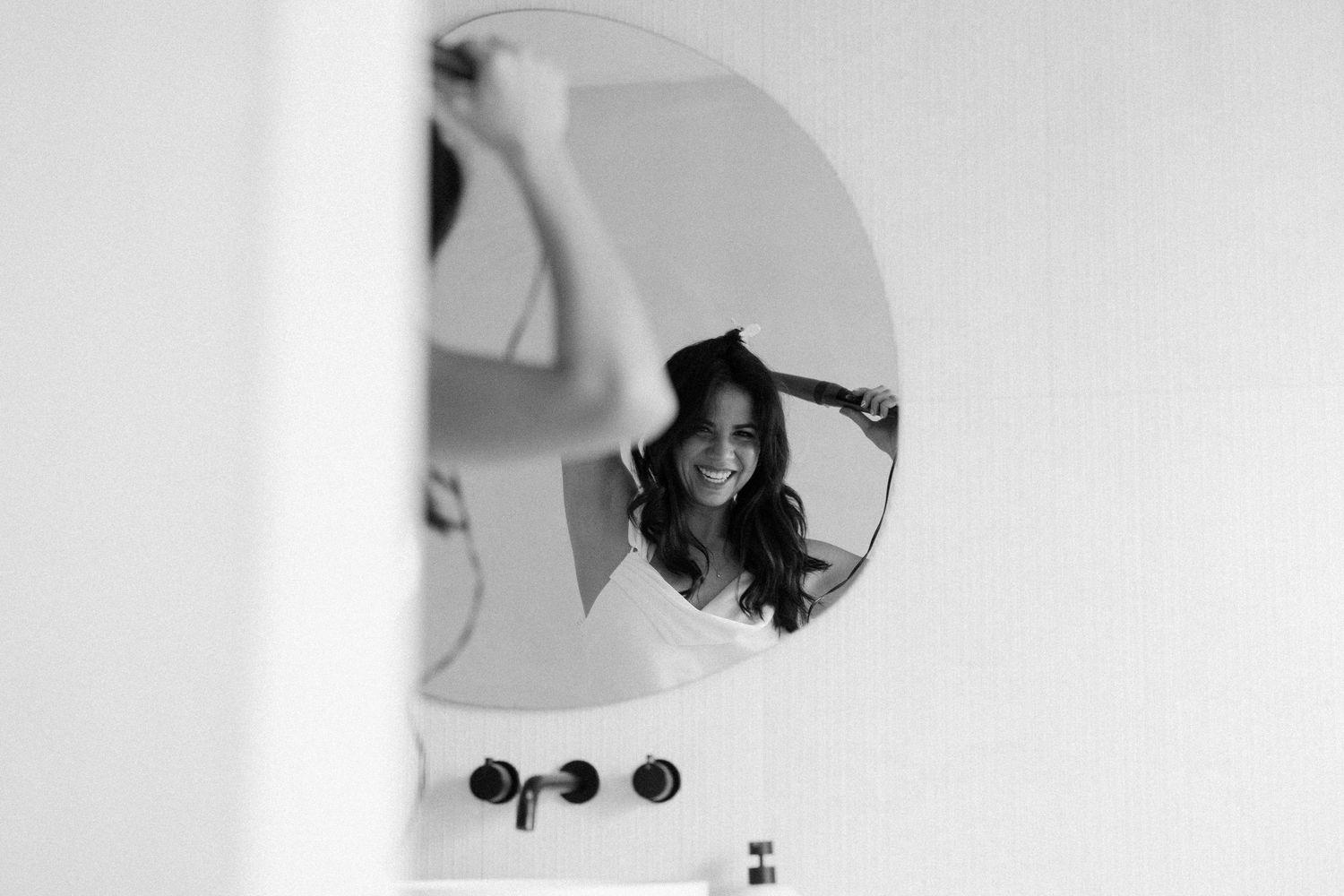 A series of black and white artistic photographs showing abstract curved shapes and shadows.