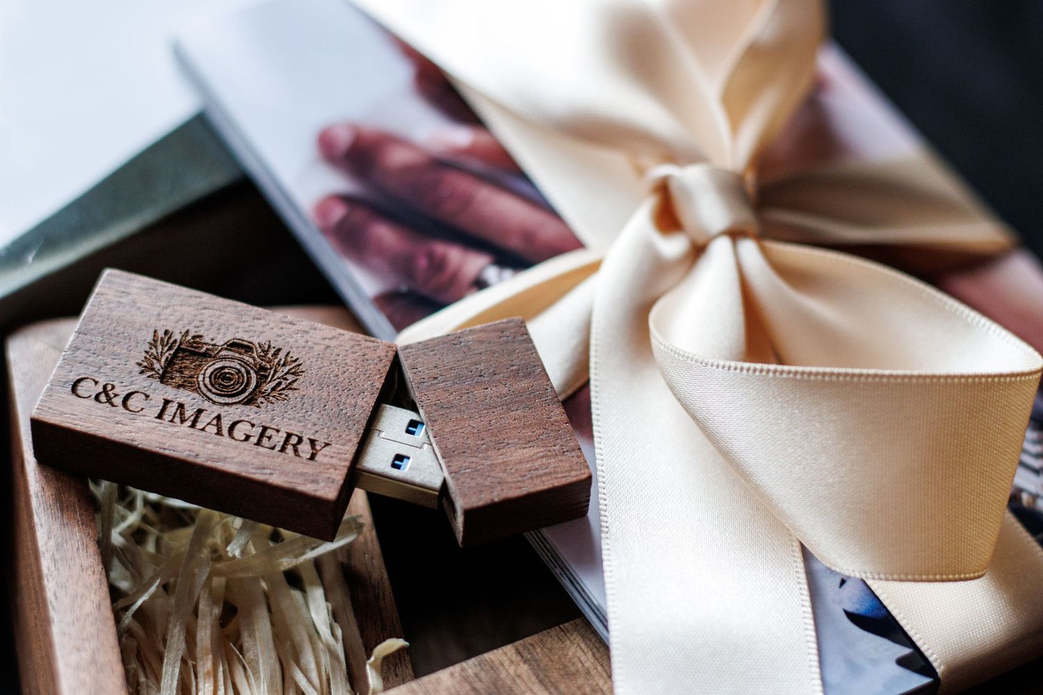 Photography equipment and accessories arranged artistically on a wooden surface.