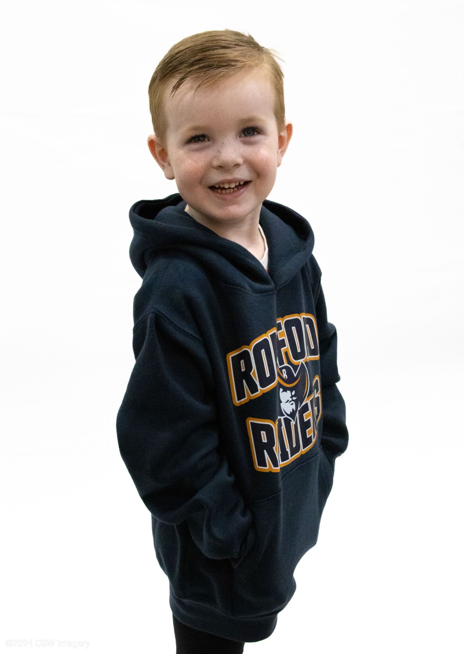 Young fan wearing navy blue hockey team hoodie with gold lettering.