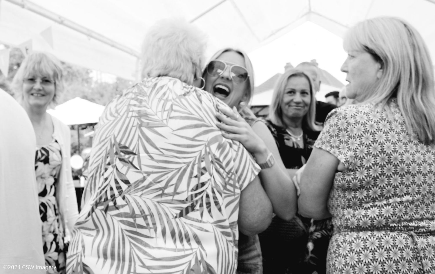 Guests mingling and socializing at an elegant wedding reception.