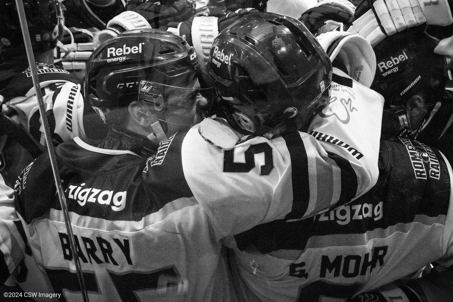 Black and white collage of hockey players in action during game.