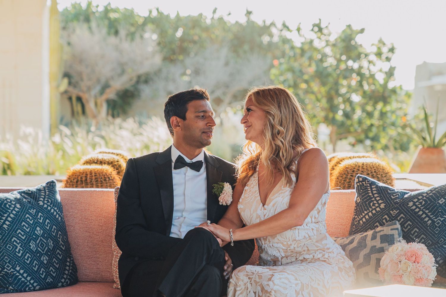 Wedding celebration photos showing intimate moments between couples in an outdoor garden setting at golden hour.