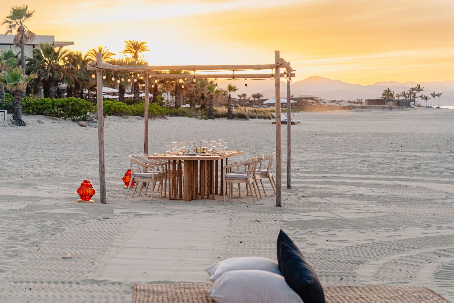 A series of beach sunset images showing palm trees, wooden furniture, and sandy shores at dusk.
