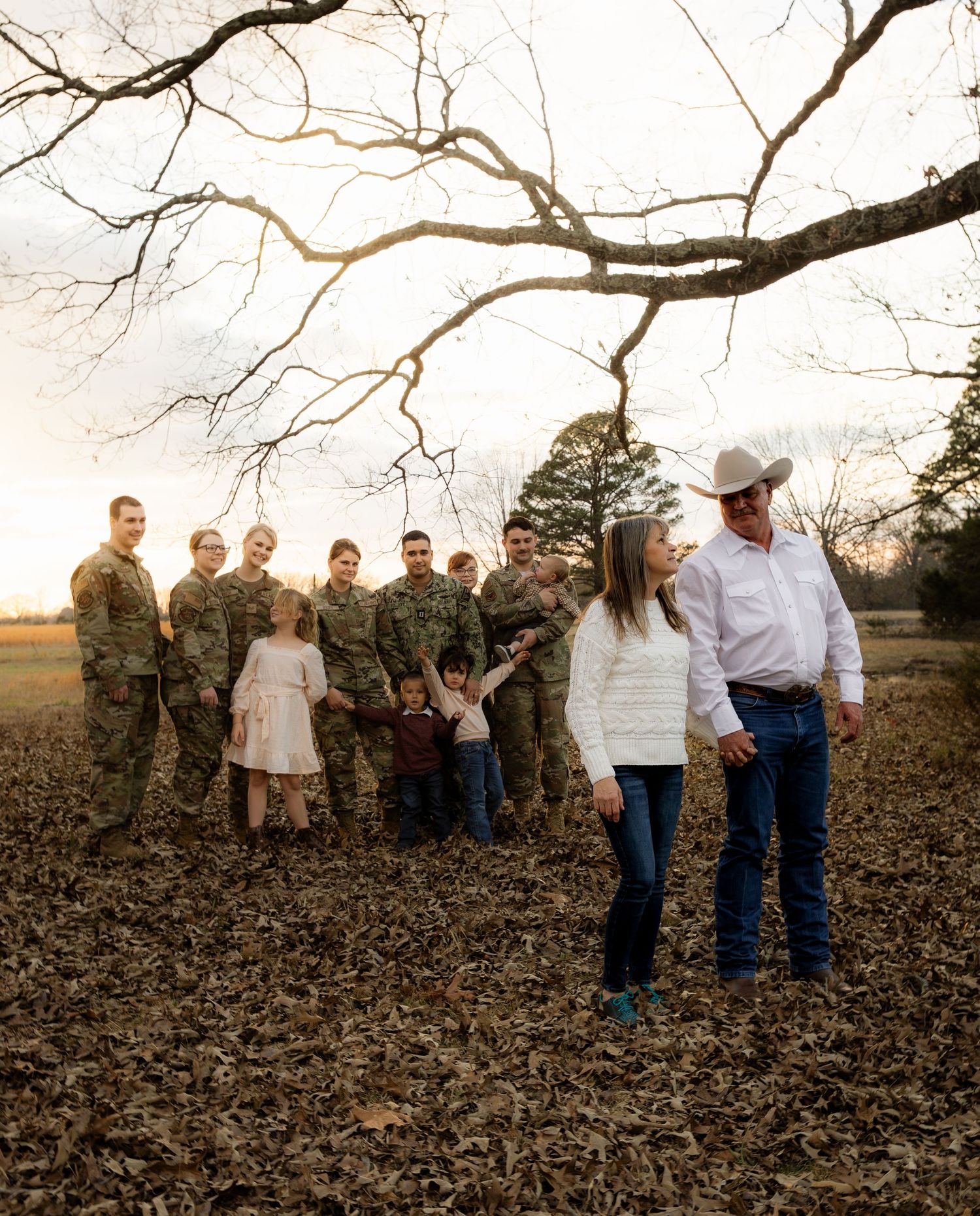 Military Family Older couple in front of the rest of family
