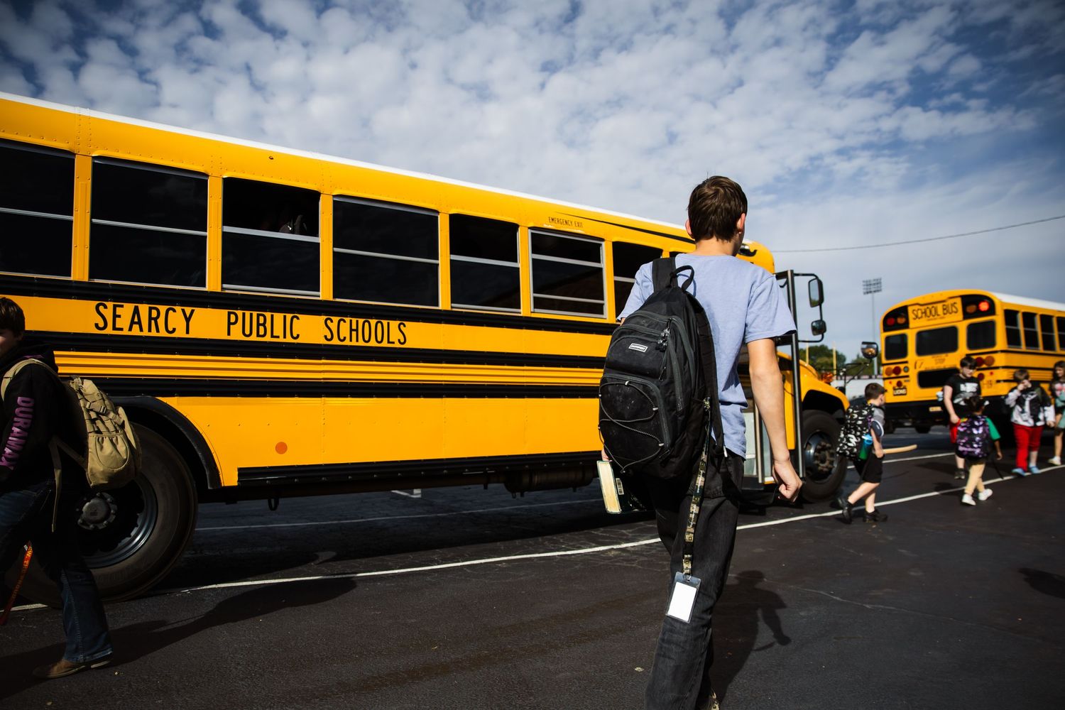 Kid getting on bus