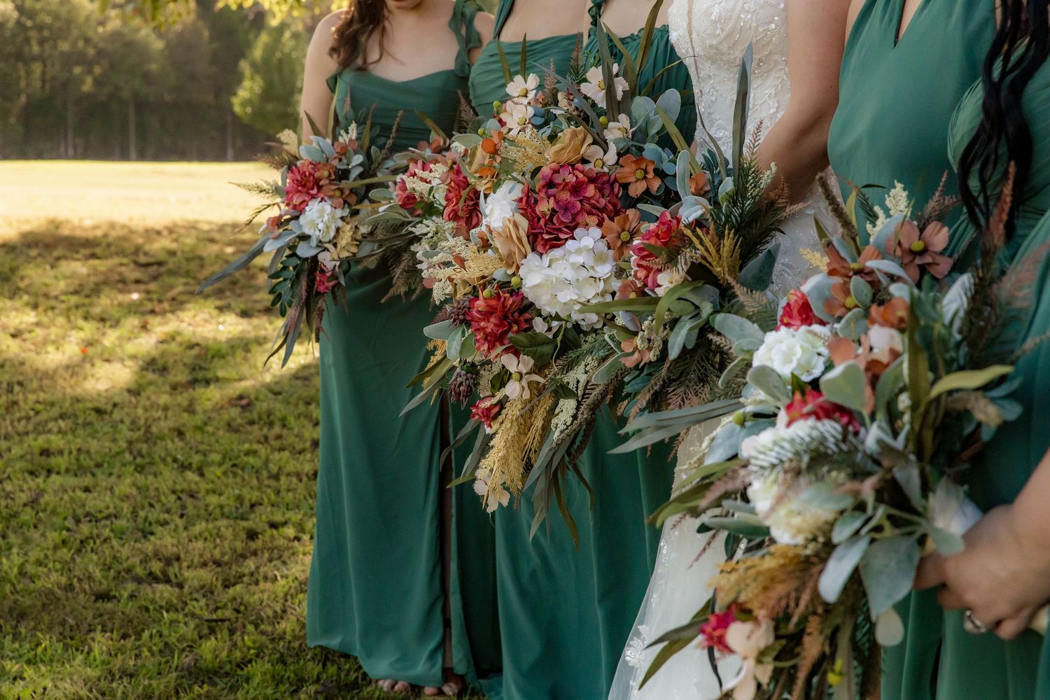 Detail shot of bride and bridesmaids holding bouquets