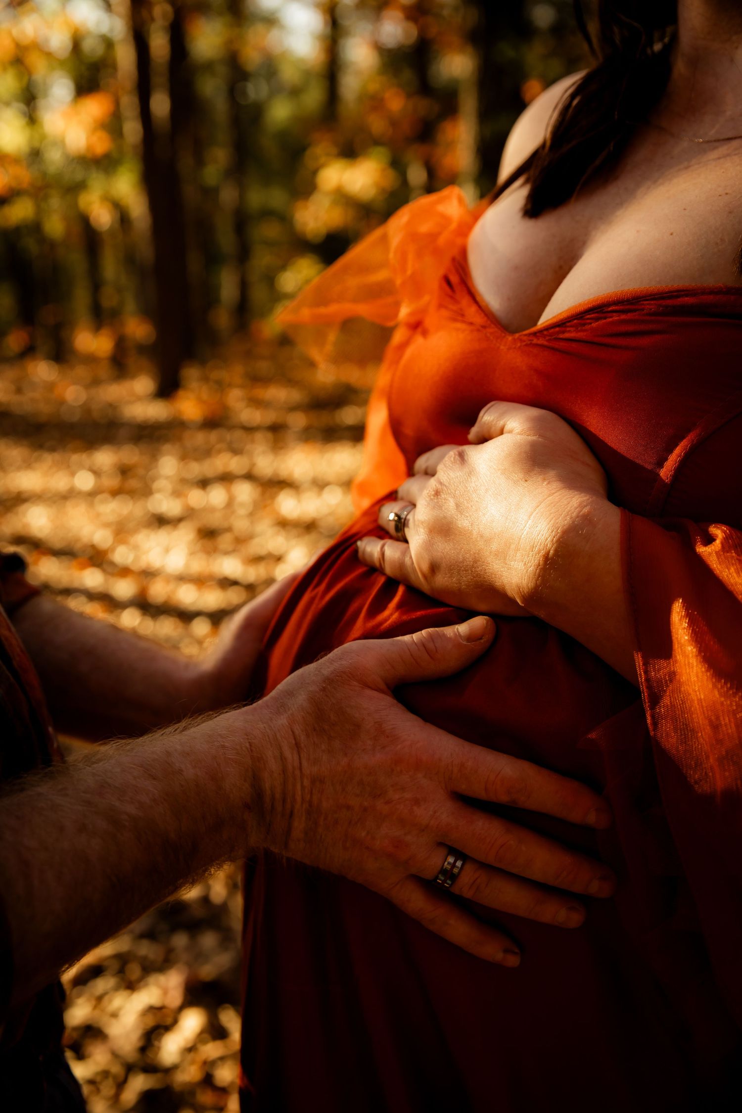Maternity detail hands on belly