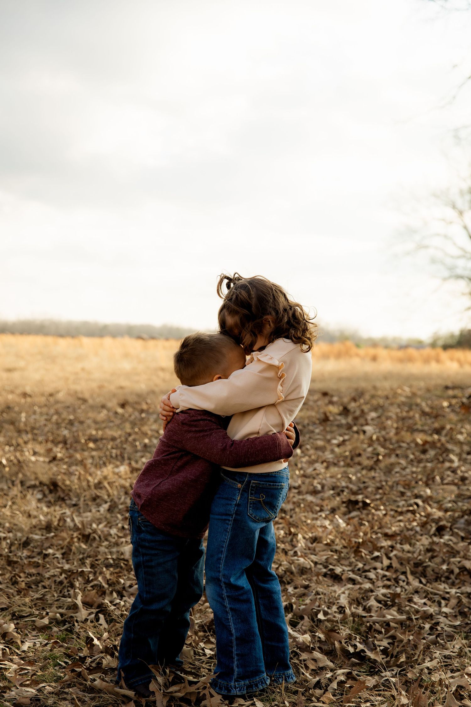 Two Siblings hugging