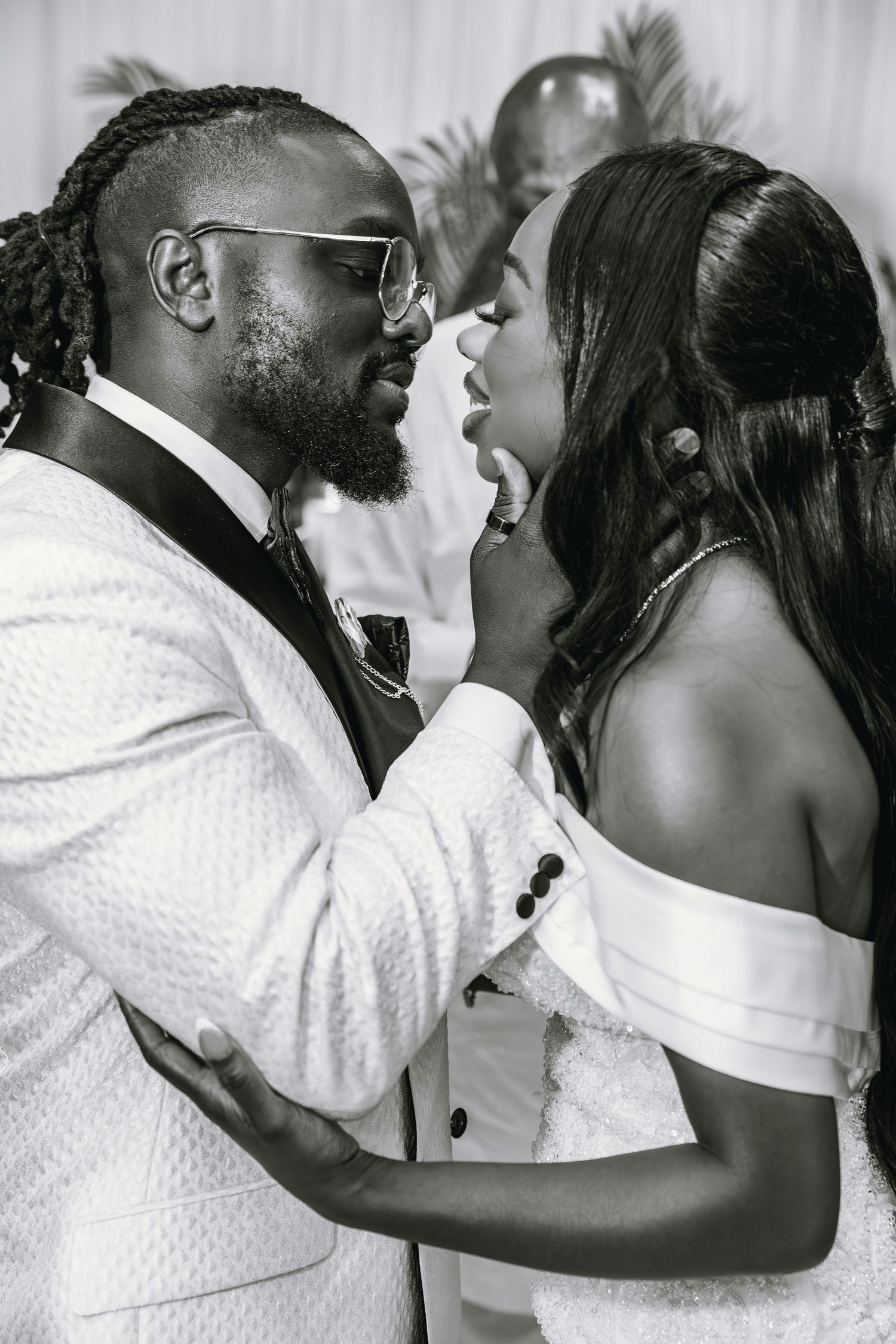 A series of romantic wedding kiss photos showing tender moments between the newlyweds.