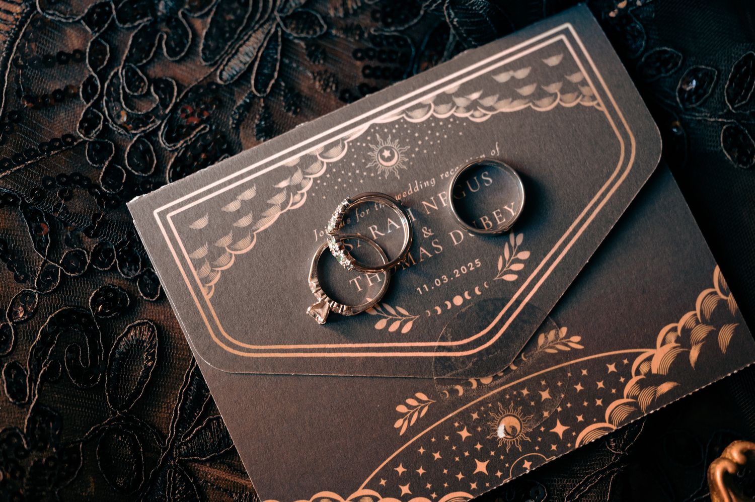 Artistic close-up of decorative dark boxes with intricate pattern details.
