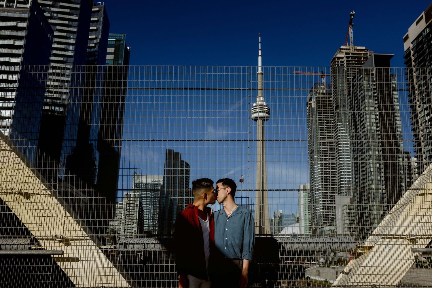 Romantic urban photo with Toronto cityscape and CN Tower in background.