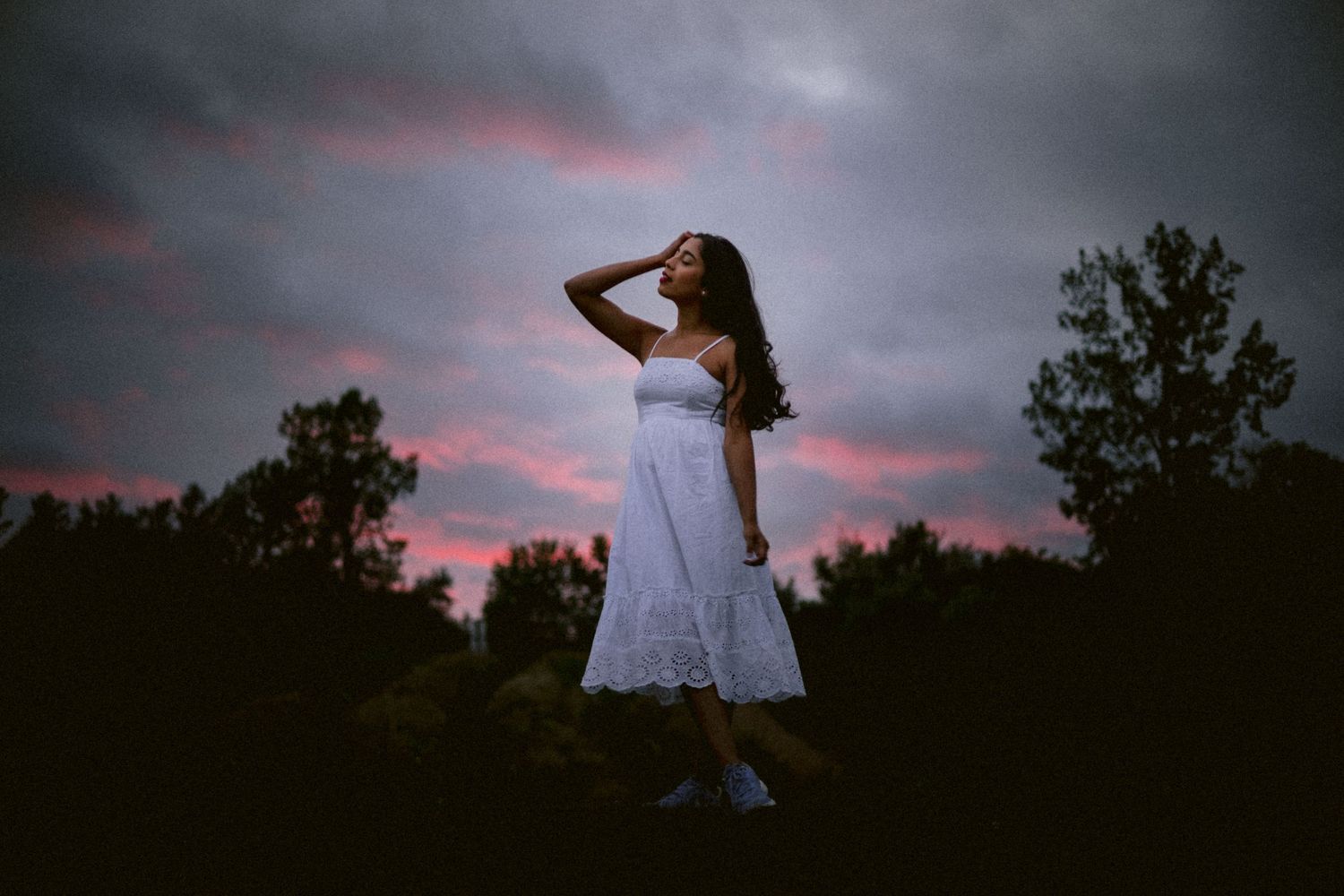Atmospheric silhouettes at sunset showing figures in dramatic poses.