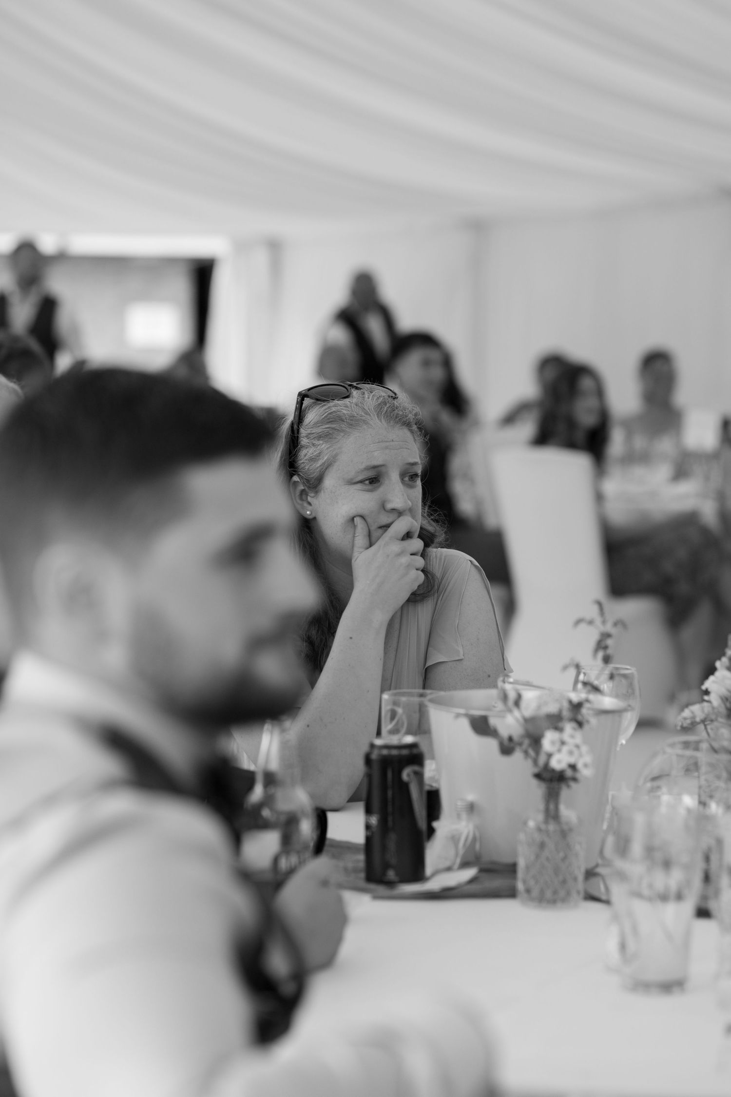 Portrait of a Bride's sister tearing up during the wedding speeches.