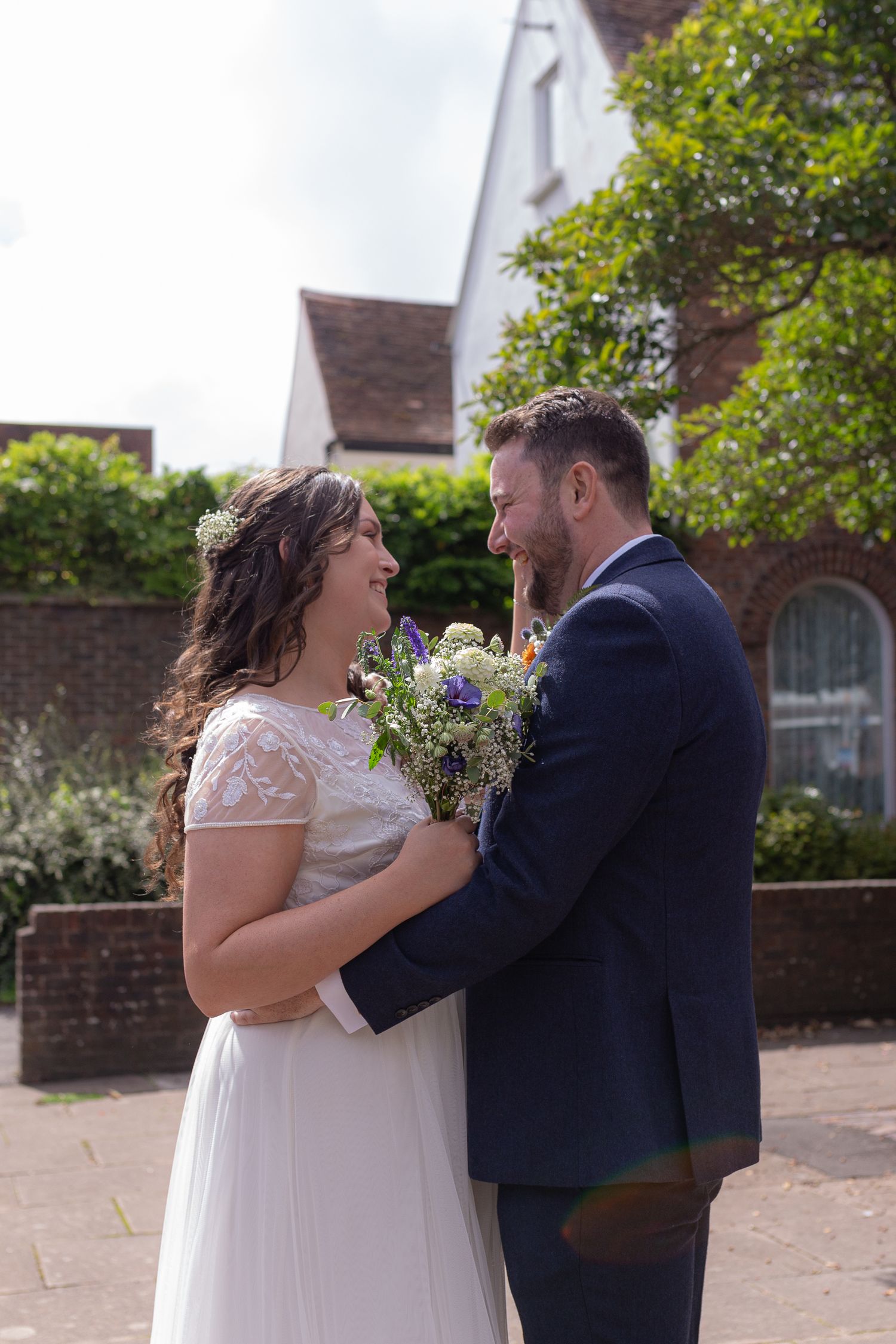 Bride and Groom stand together, in each others arms, during a intimate, private first look