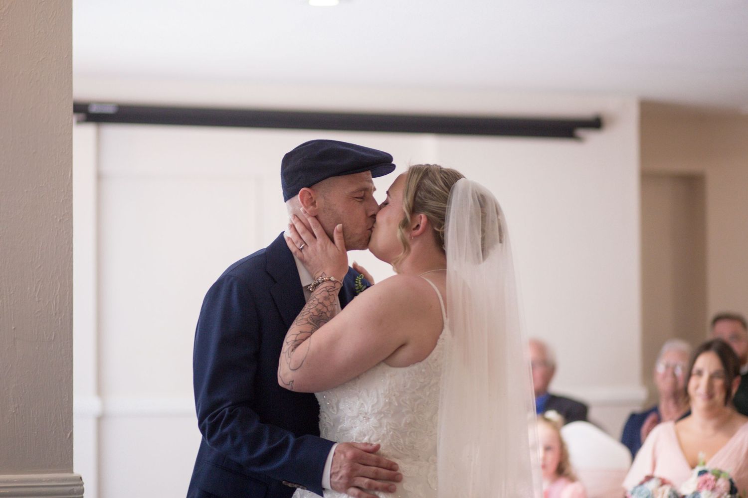 Bride and Groom share their first kiss as a married couple during their wedding ceremony at the hotel Rembrandt