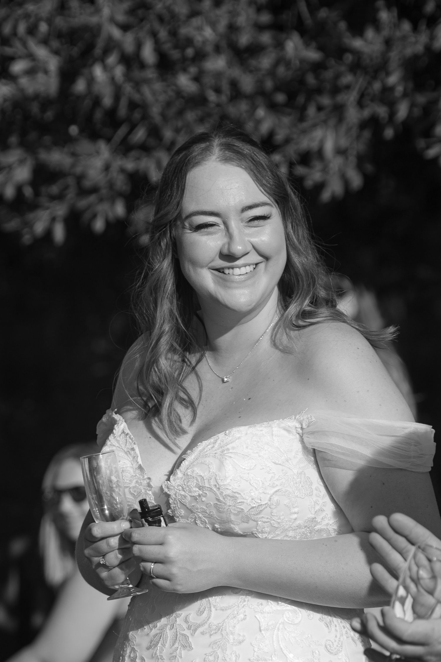 Black and White photo of a Bride smiling
