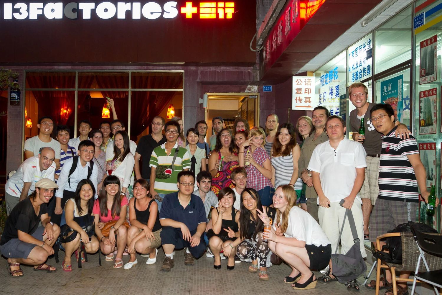 Group of travelers socializing and gathering together in various indoor and outdoor settings.