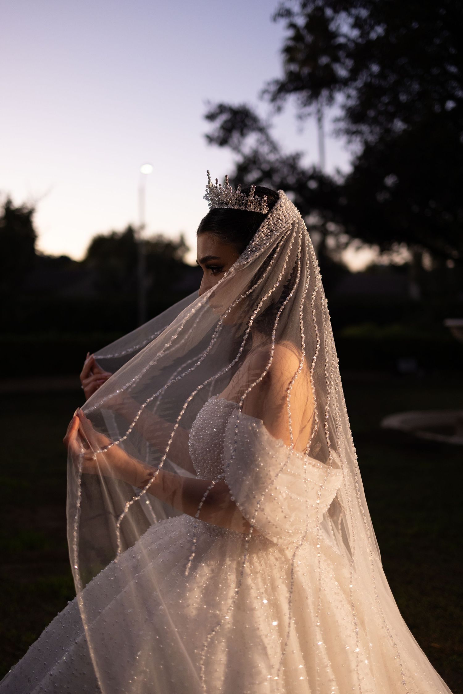 Groom adjusting his suit before the ceremony — timeless LA wedding moment.